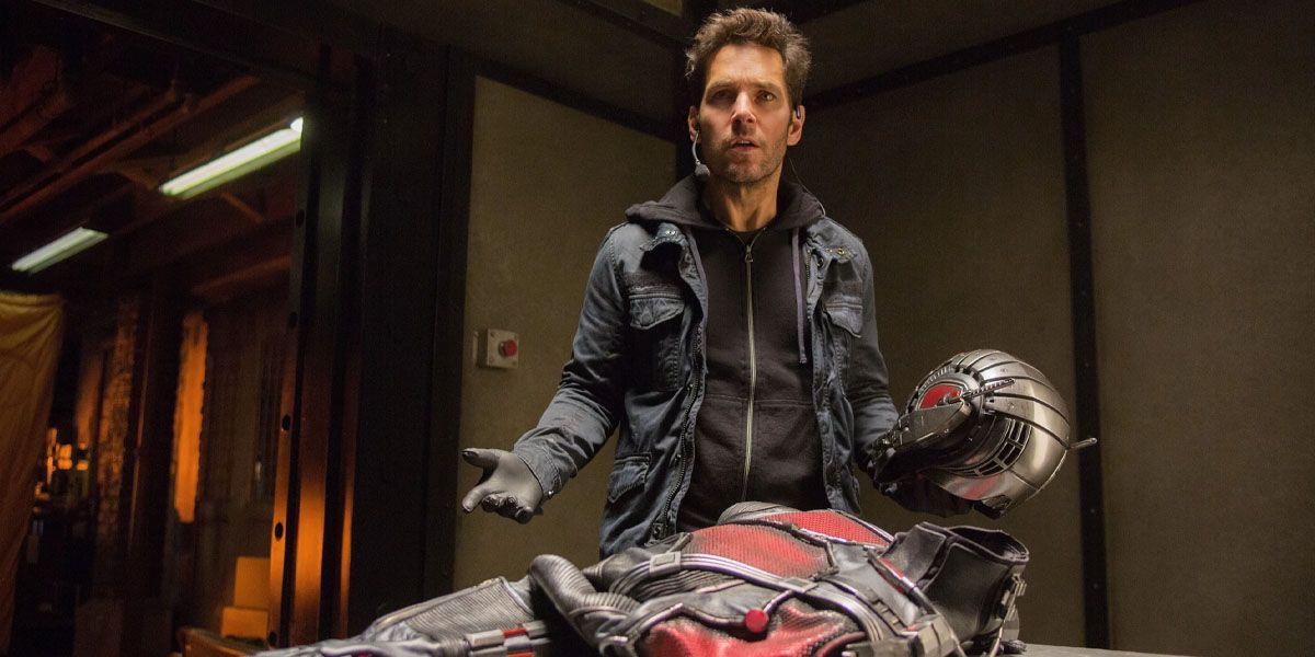 Scott Lang Holding the Ant-Man suit for the first time In Ant-Man