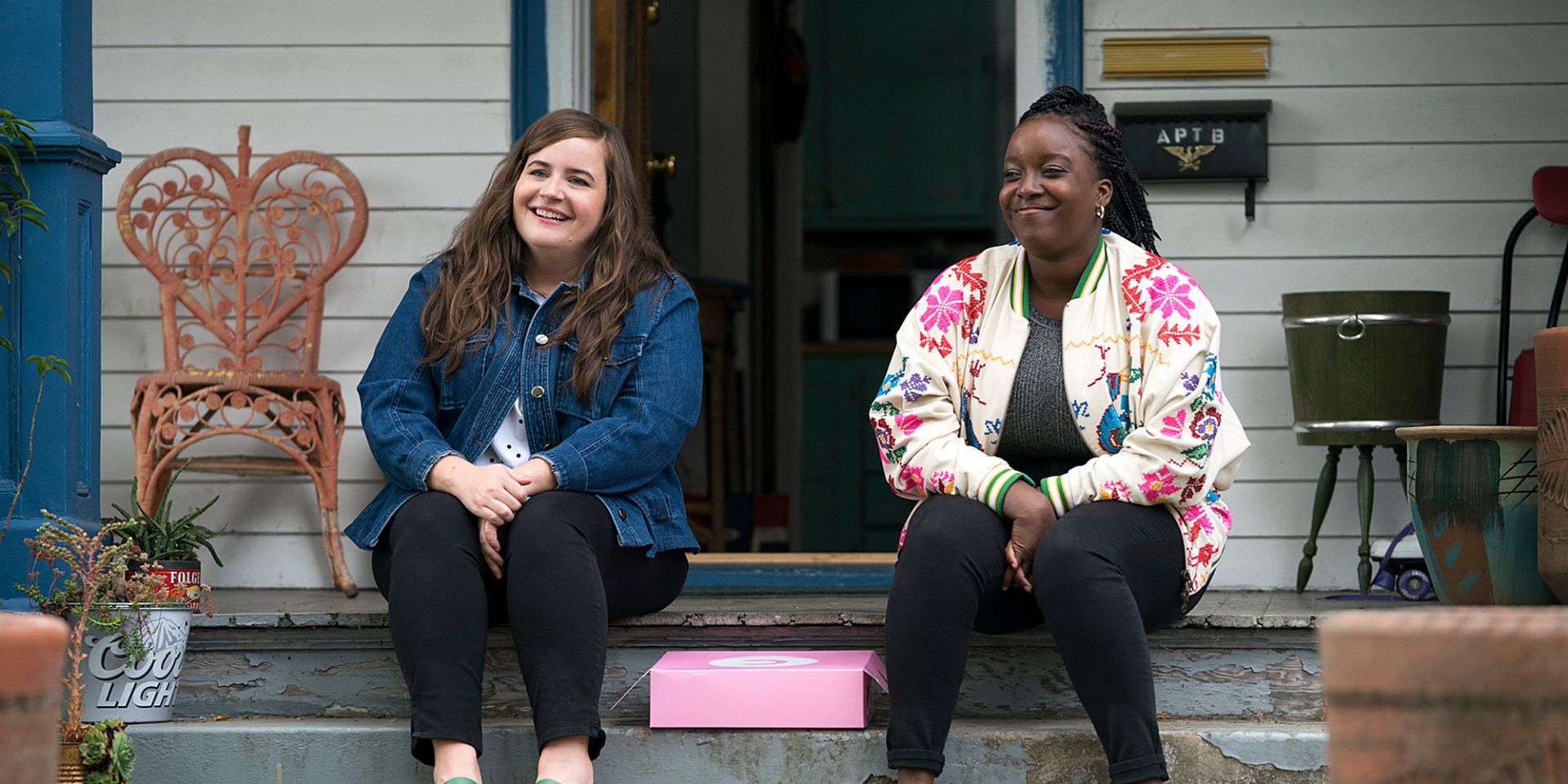 Annie and Fran sit on the porch in Shrill