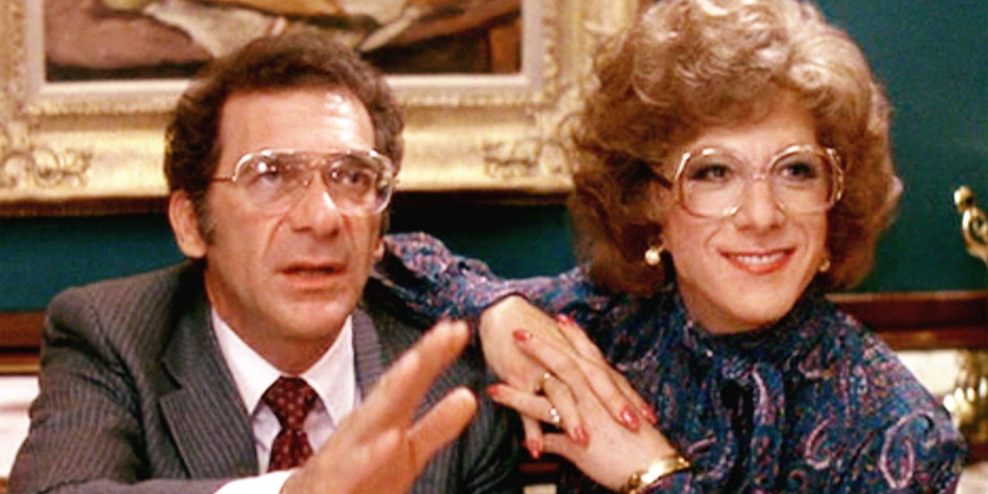 Sydney Pollack como George Fields no almoço com Dustin Hoffman como Dorothy Michaels em Tootsie