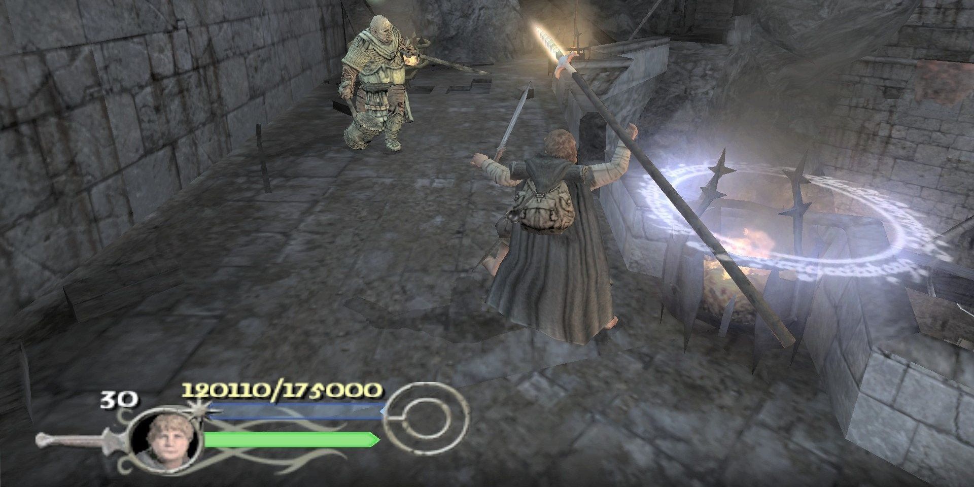 Samwise Gamgee fights an orc in The Lord of the Rings Return of the King video game