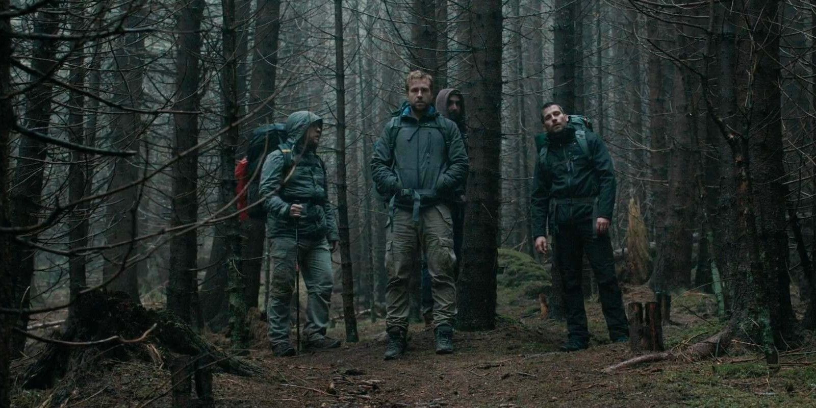 The protagonists deep in the woods in The Ritual