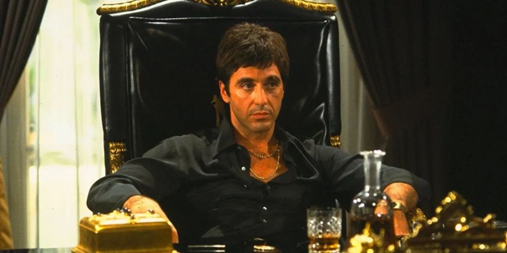 Tony Montana sits in his office in Scarface (1983)