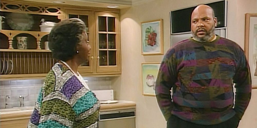 Uncle Phil and Hattie in the kitchen, speaking about his father