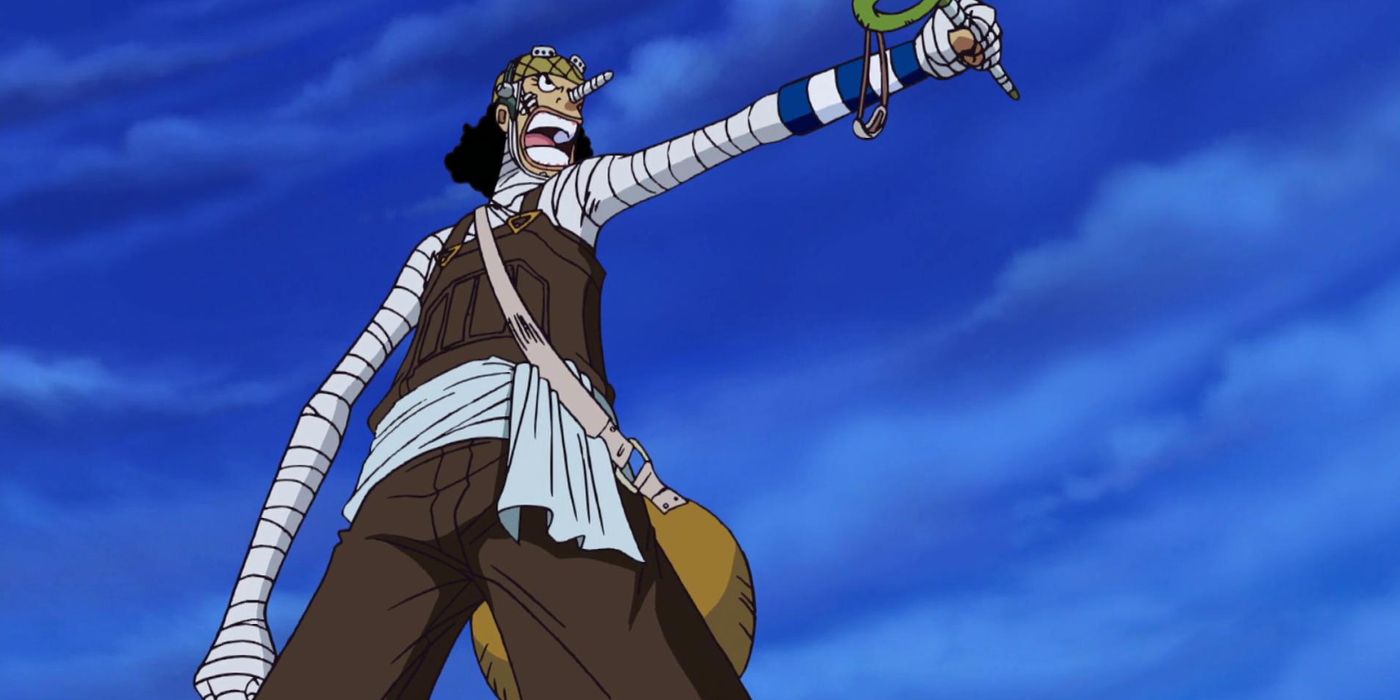 Usopp raises his slingshot as he yells to Luffy in One Piece.