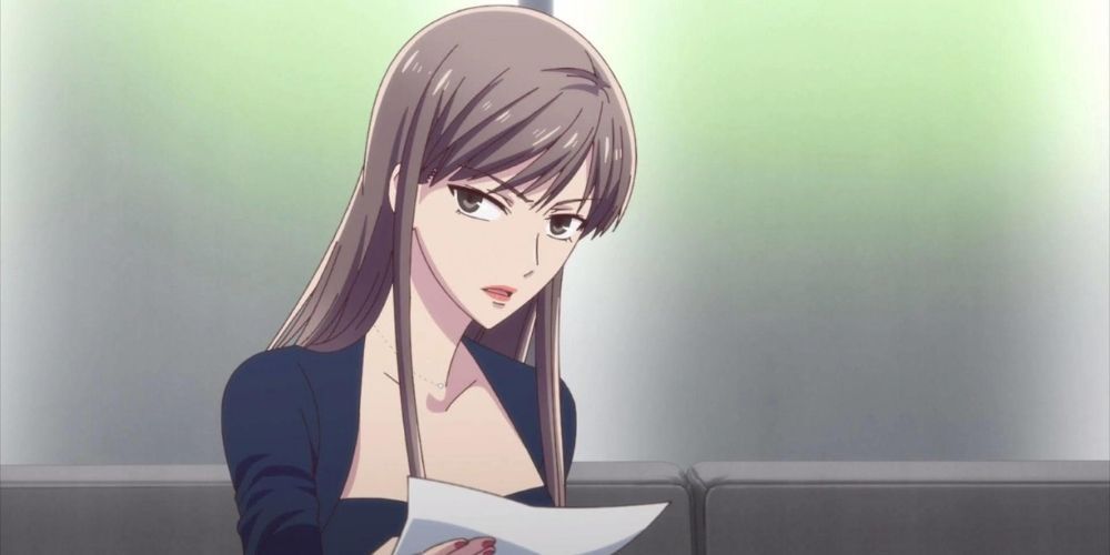 Yukis Mother looking at paper in Fruits Basket