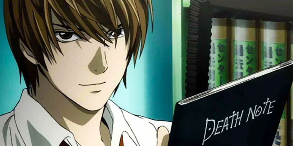 Light Yagami holding the Death Note in the Death Note anime