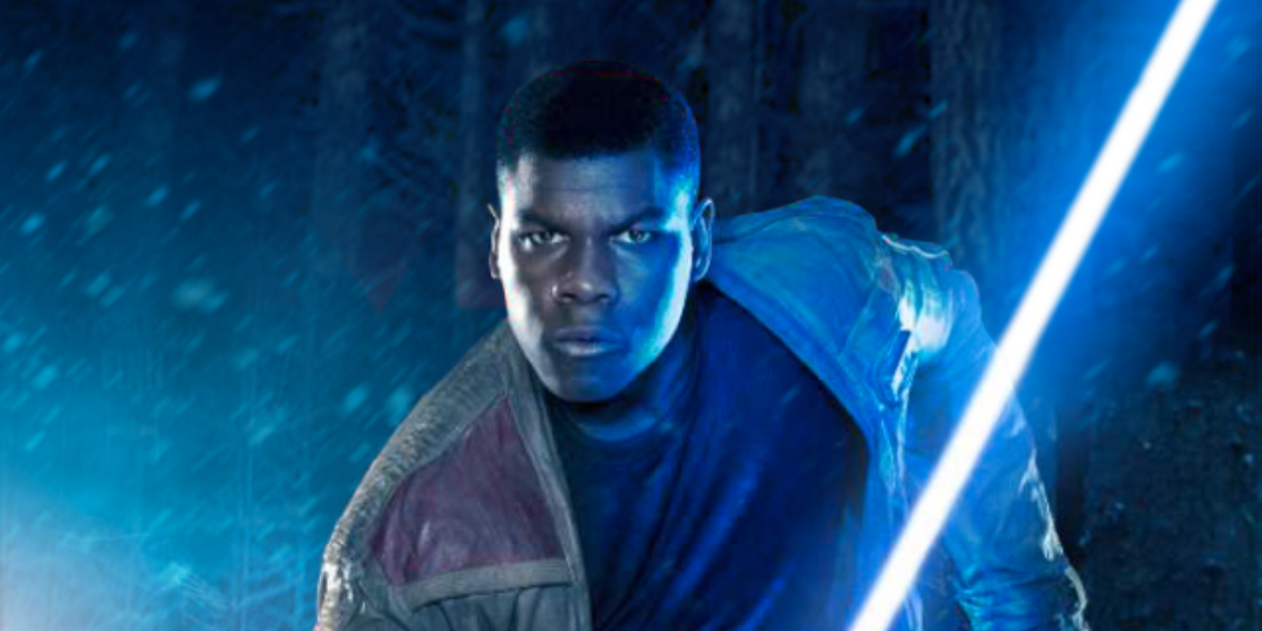 Finn holding Luke's lightsaber in Star Wars The Force Awakens