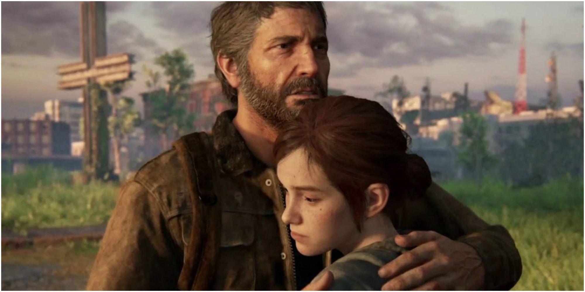 Joel and Ellie from The Last of Us share a hug