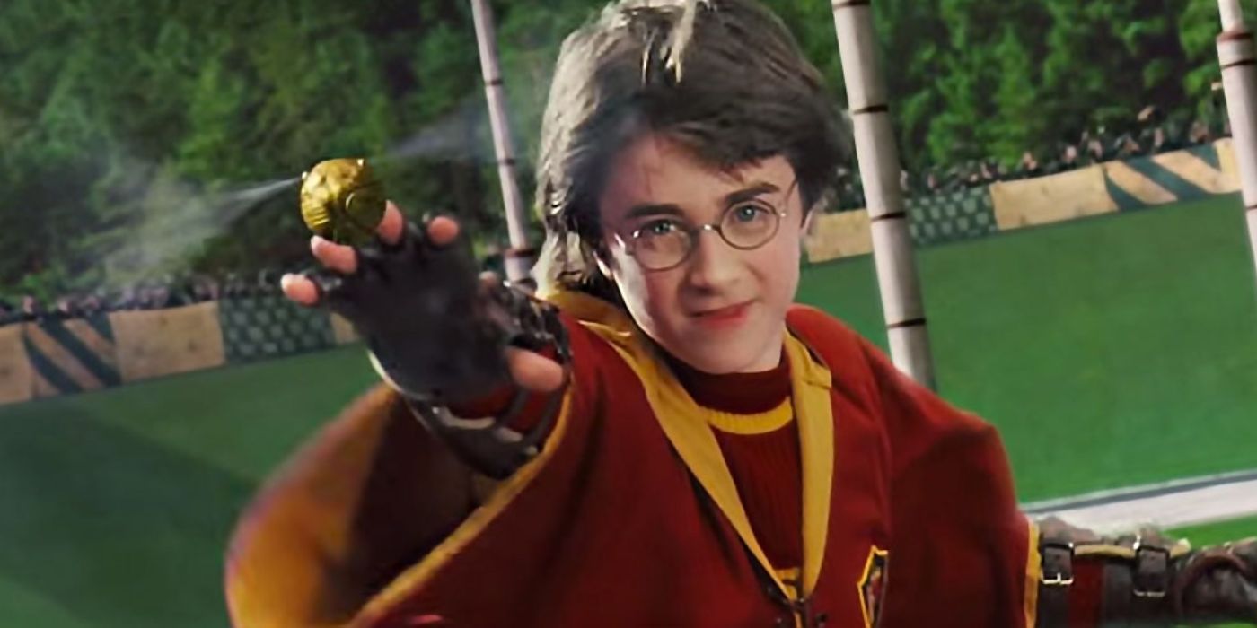 Harry catching the Golden Snitch in Harry Potter.