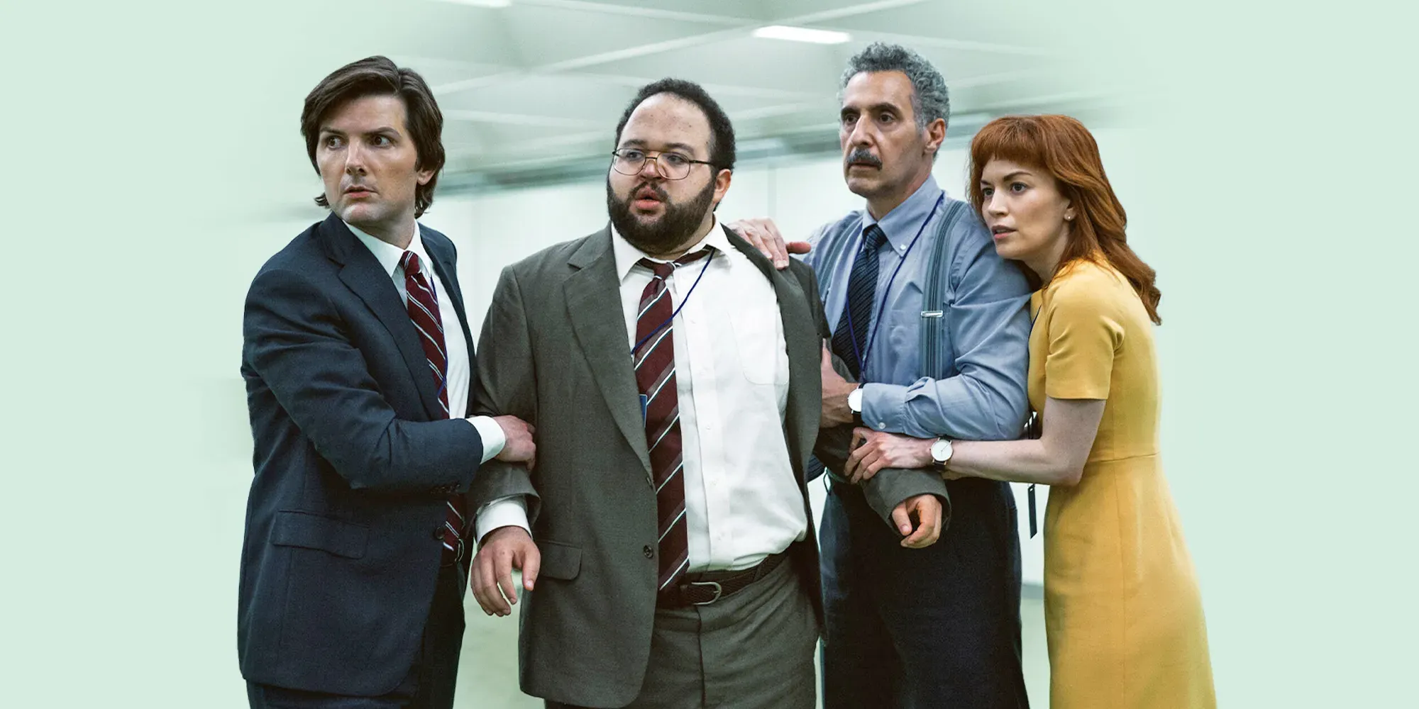 The main cast of AppleTV's Severance, Mark, Helly, Irving and Dylan, standing together. 