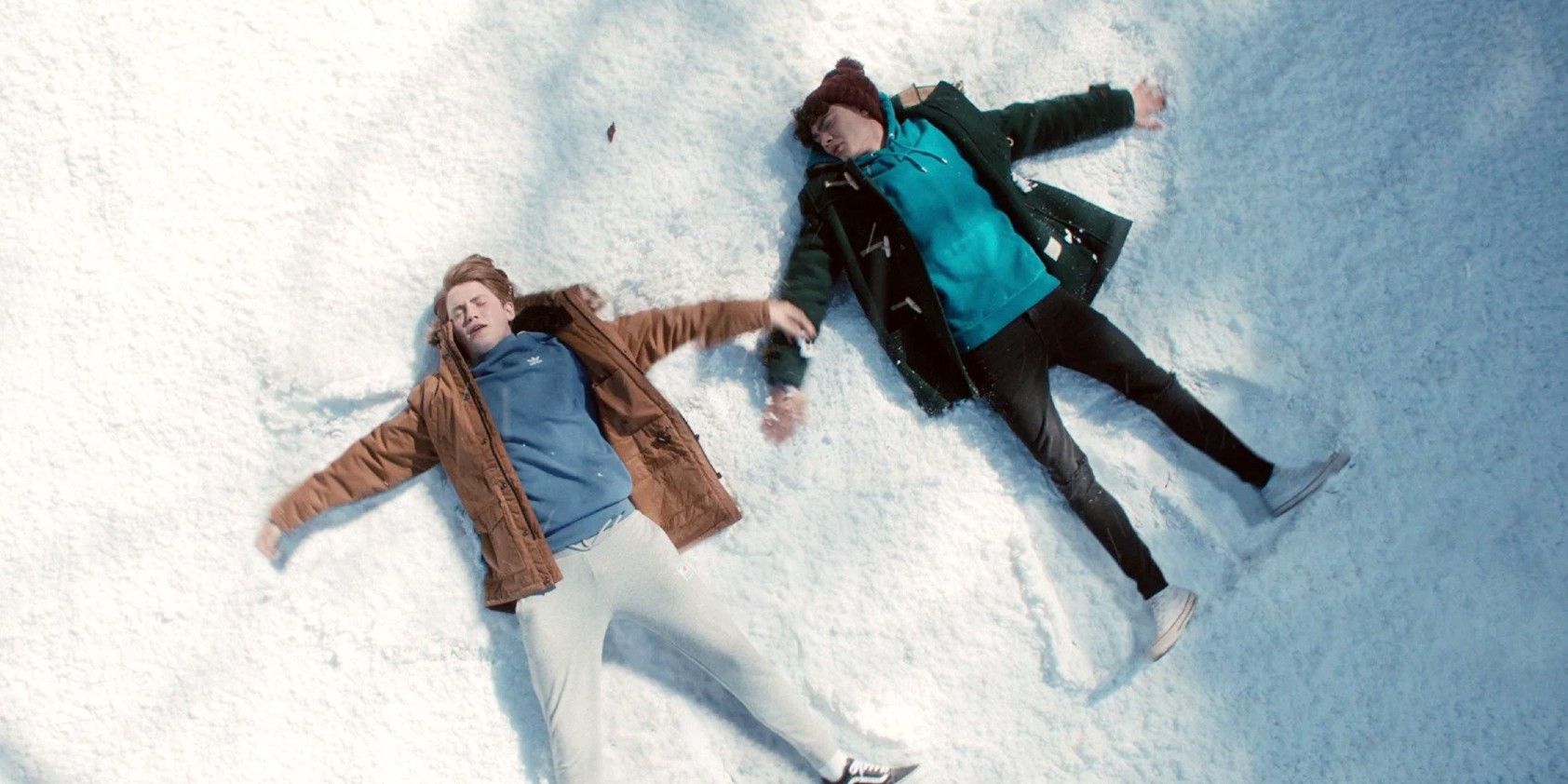 Nick and Charlie doing snow angels