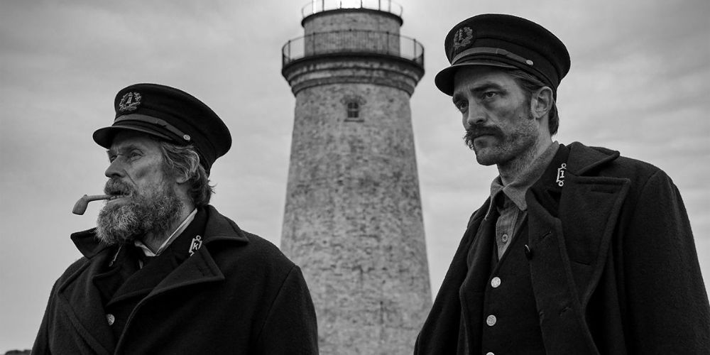 Willem Dafoe and Robert Pattinson as Winslow and Tom in The Lighthouse