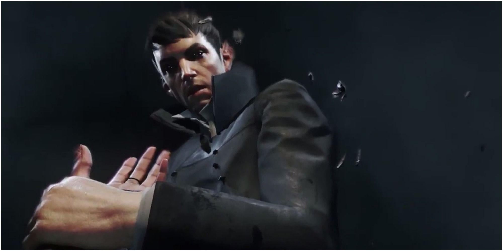The Outsider from Dishonored looks down at the camera while fidgeting with his sleeve