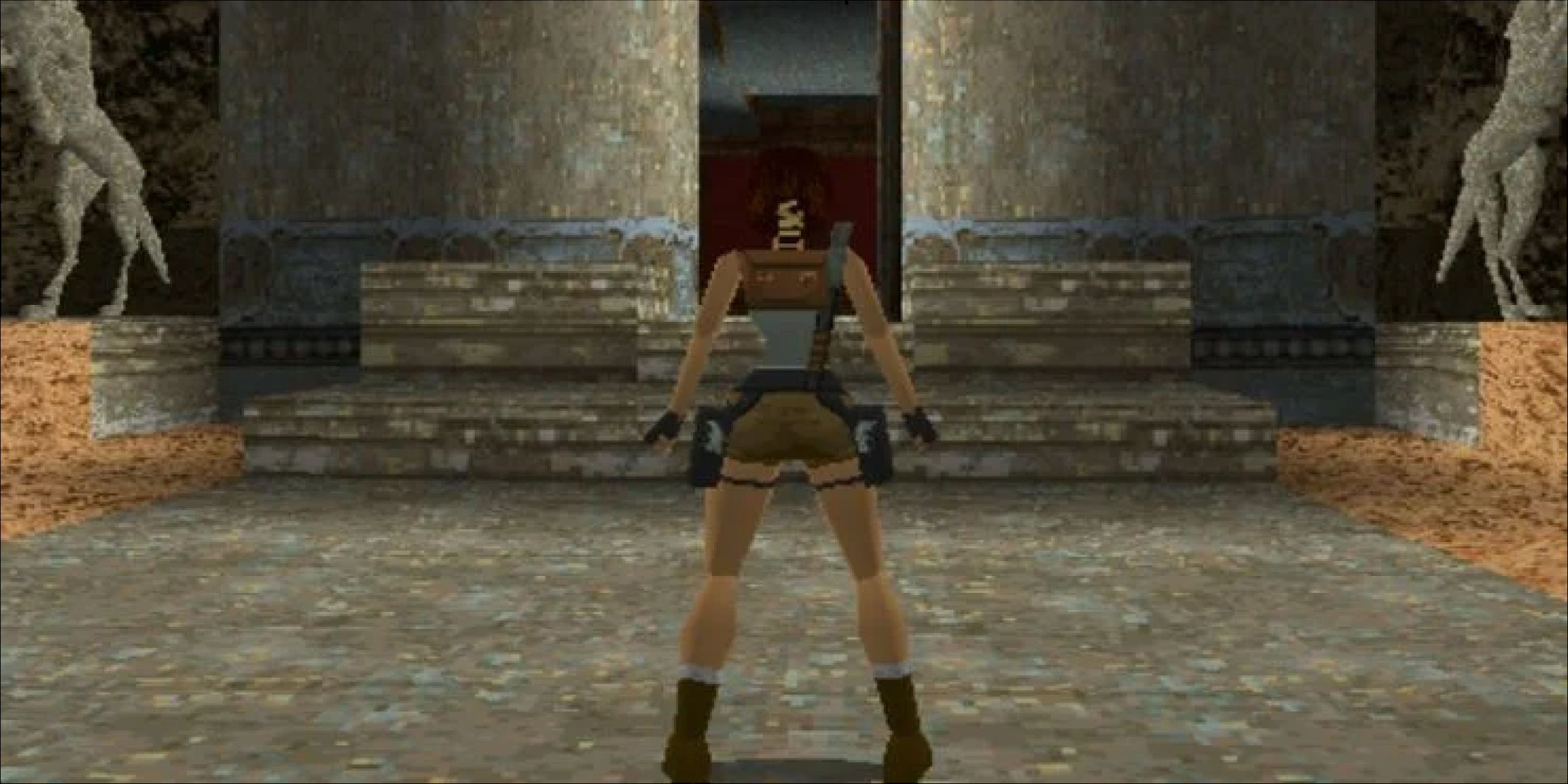 Lara Croft exploring ruins in Tomb Raider game