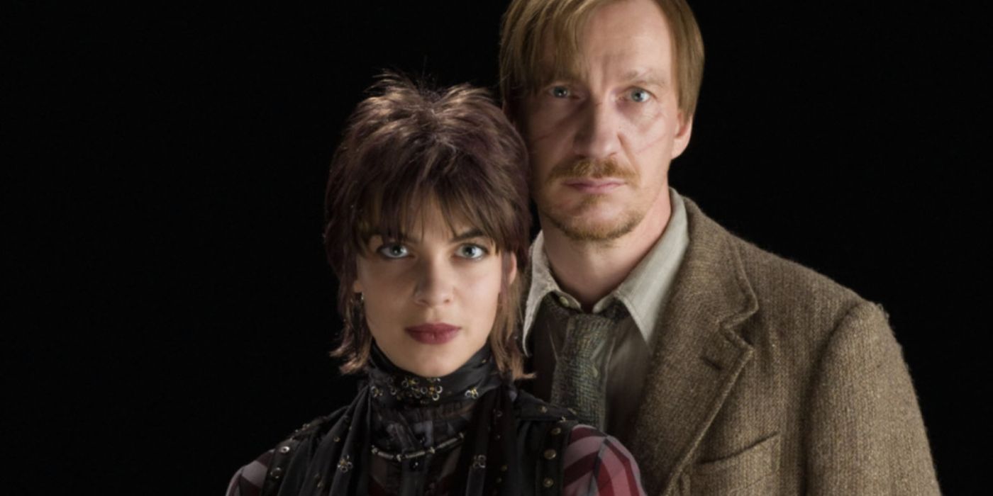 Nymphadora Tonks And Remus Lupin standing against a black background