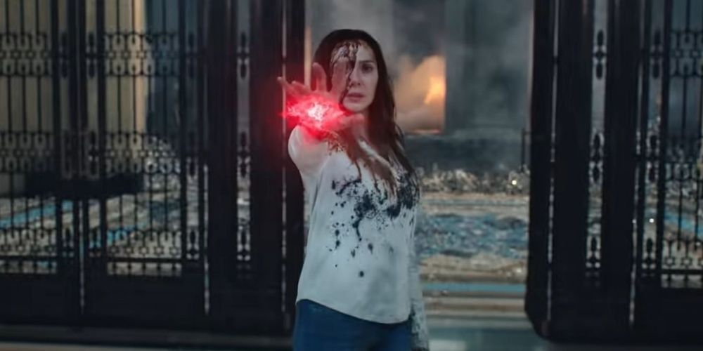 Possessed variant of Scarlet Witch using magic to attack the Illuminati
