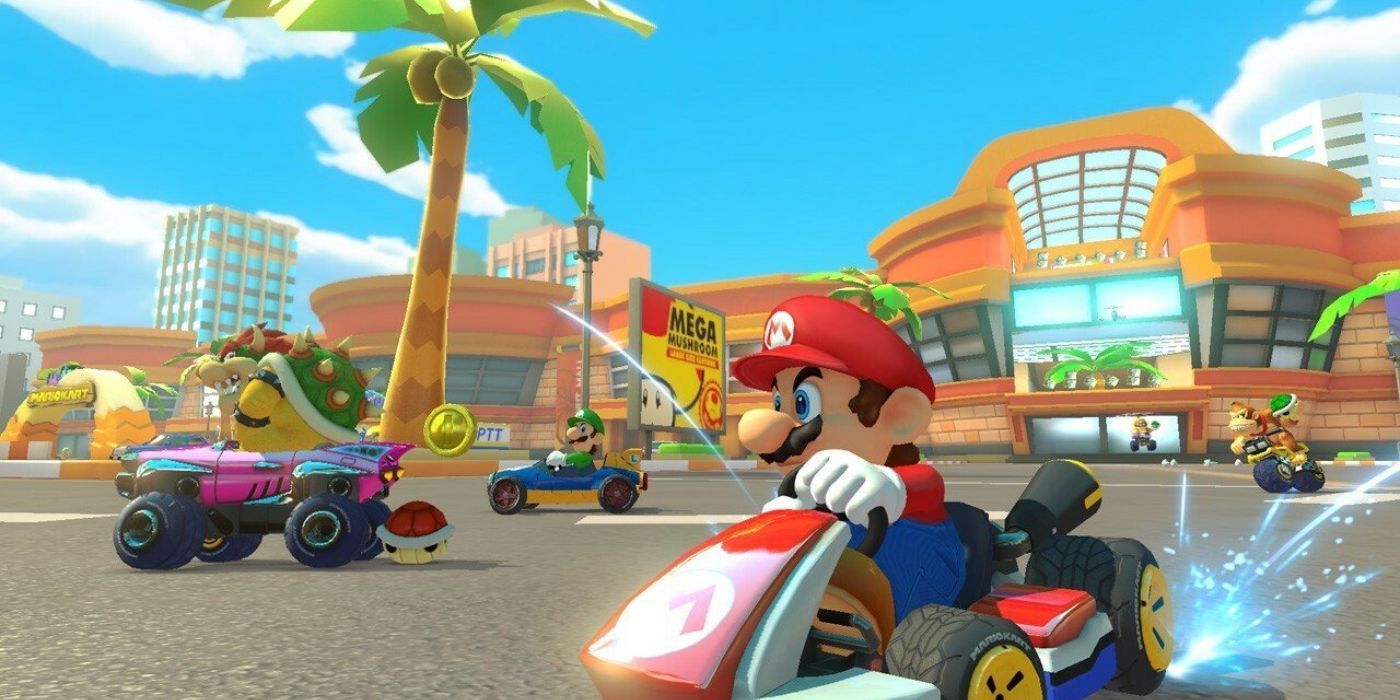 Mario, Bowser, Luigi, and Donkey Kong racing on Coconut Mall in Mario Kart 8.