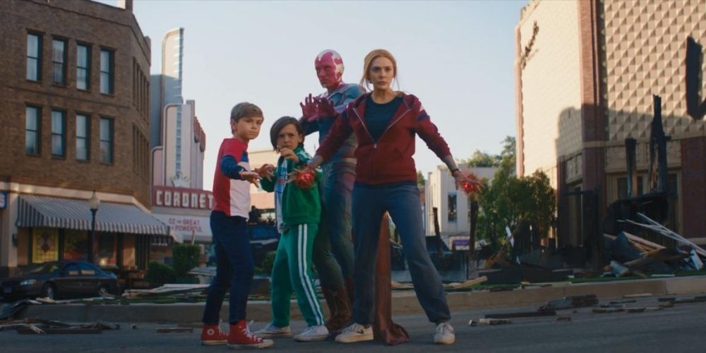 Scarlet Witch standing with Vision and her kids in WandaVision