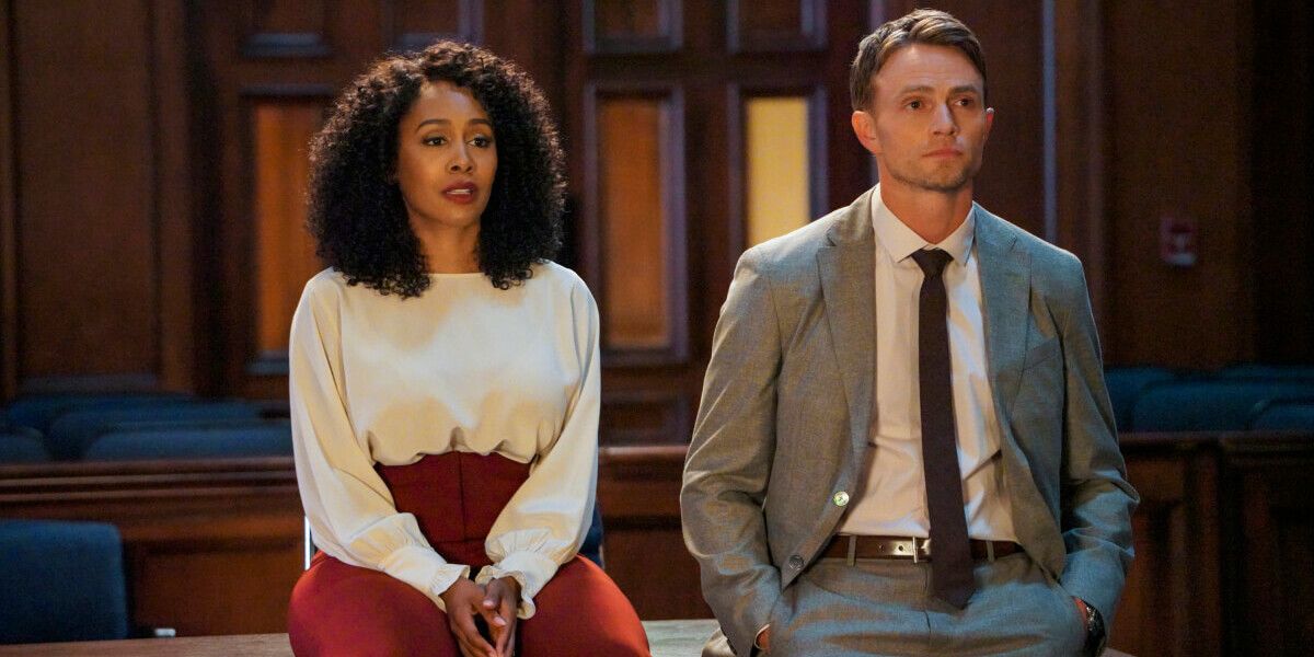 Lola and Mark (Simone Missick, Wilson Bethel) sit together in an empty courtroom in All Rise