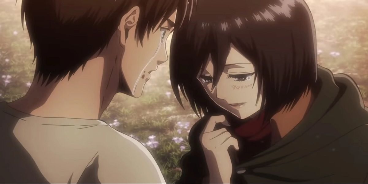 Mikasa and Eren cry together in Attack On Titan.