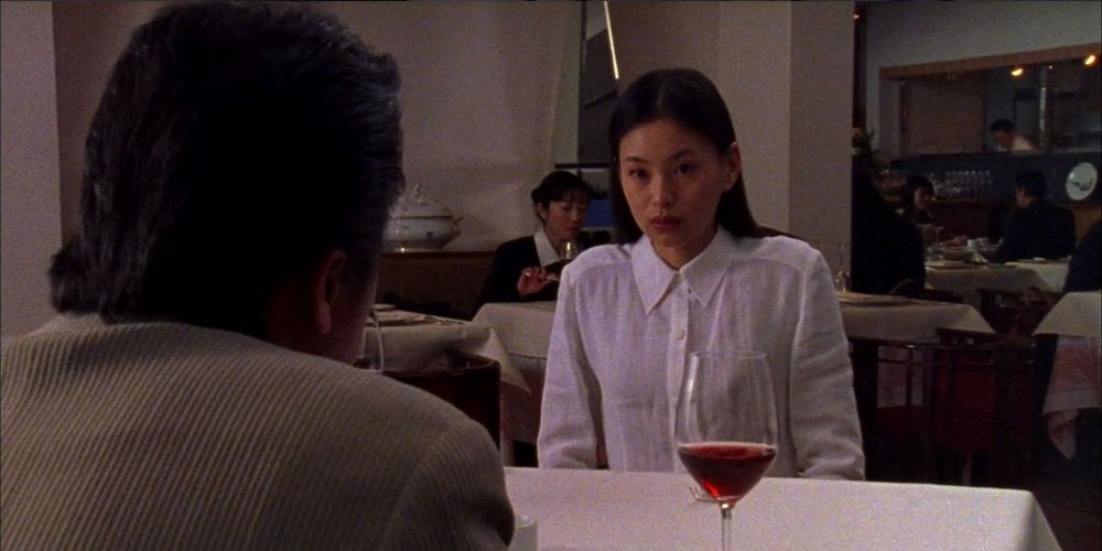 Aoyama at dinner with Asami in Audition movie