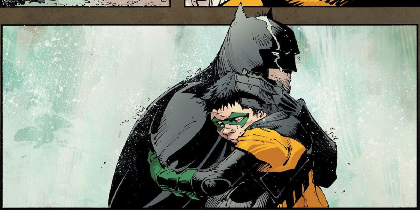 Batman hugs Robin in DC Comics