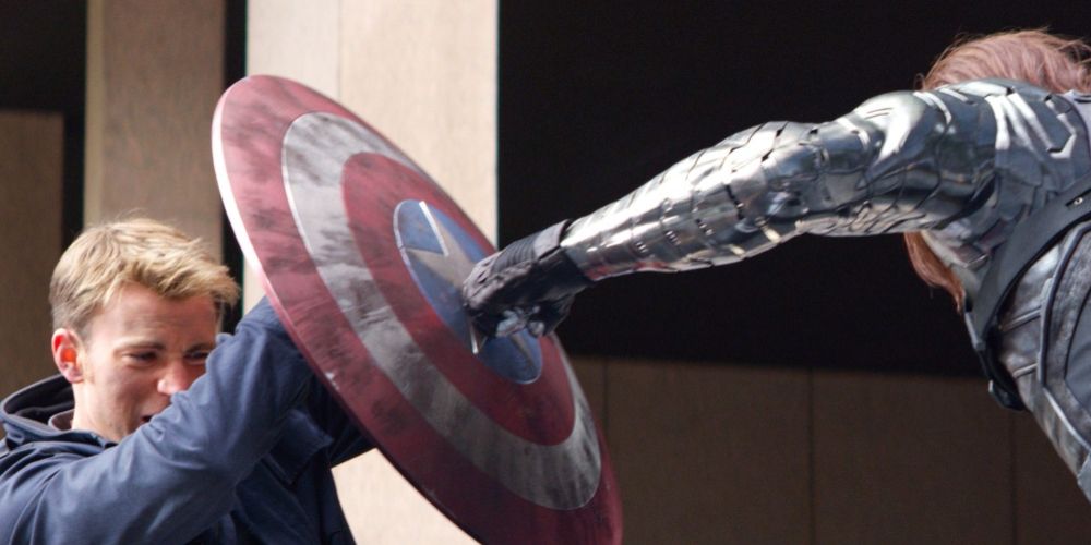 Bucky Barnes punches Steve Rogers' shield in Captain America: The Winter Soldier movie