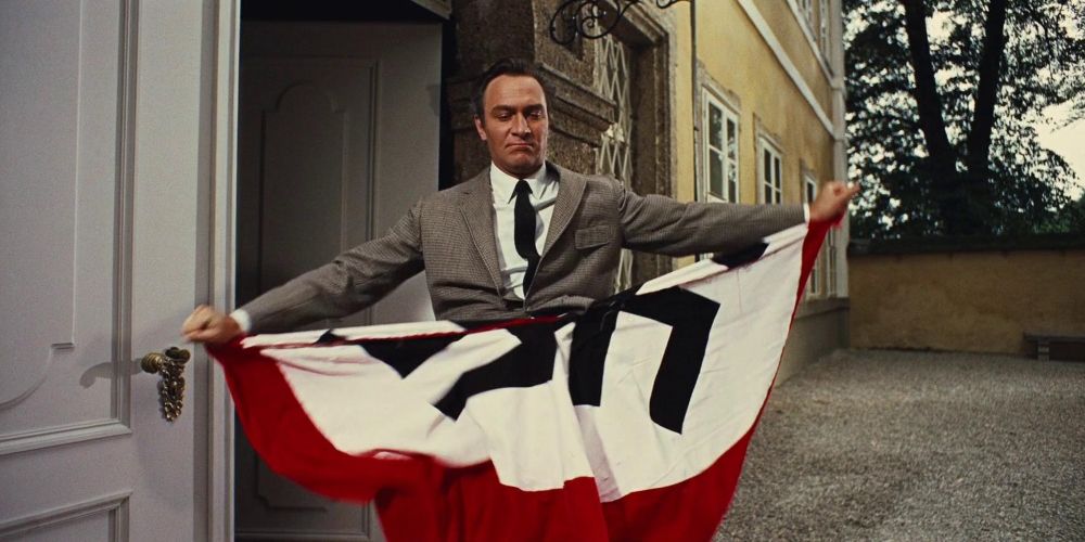 Captain von Trapp tearing up a Nazi flag in The Sound of Music movie