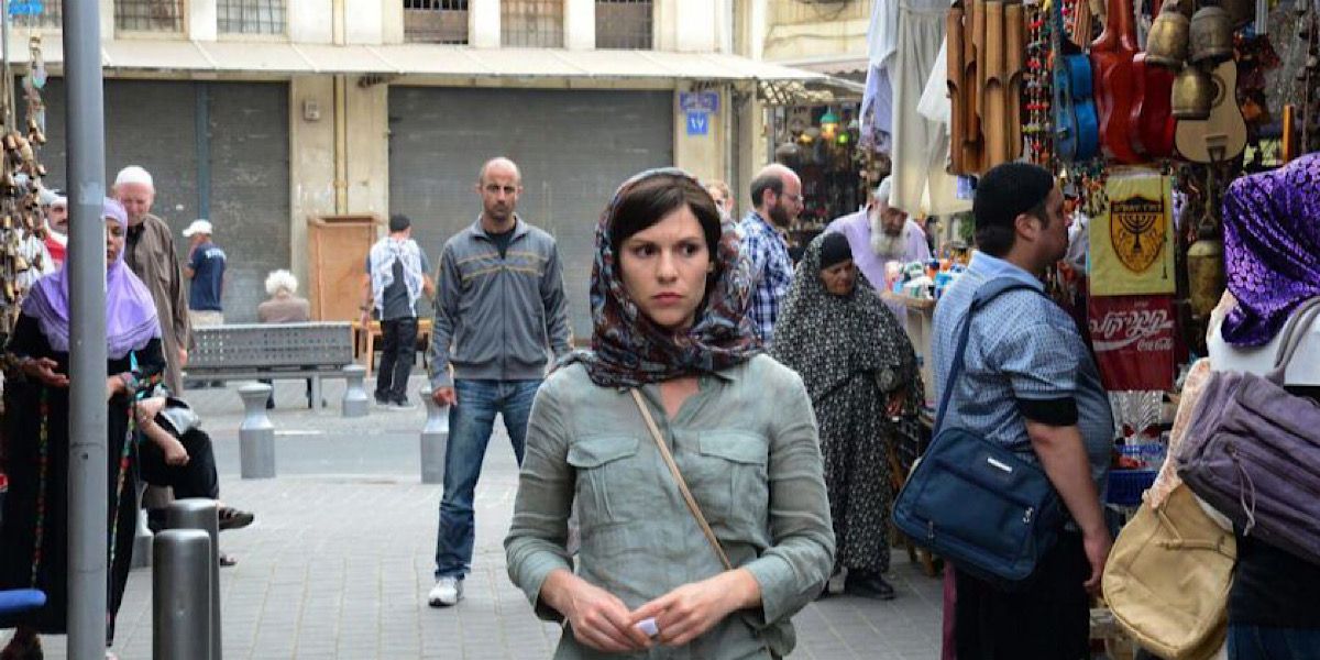 Carrie Mathison walking through a Middle Eastern street market in Homeland