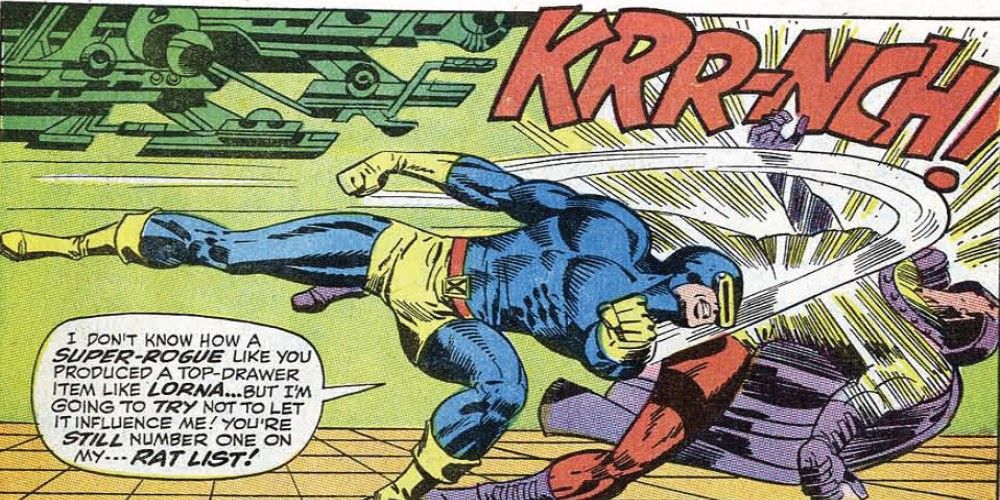 Cyclops punches Magneto in the face