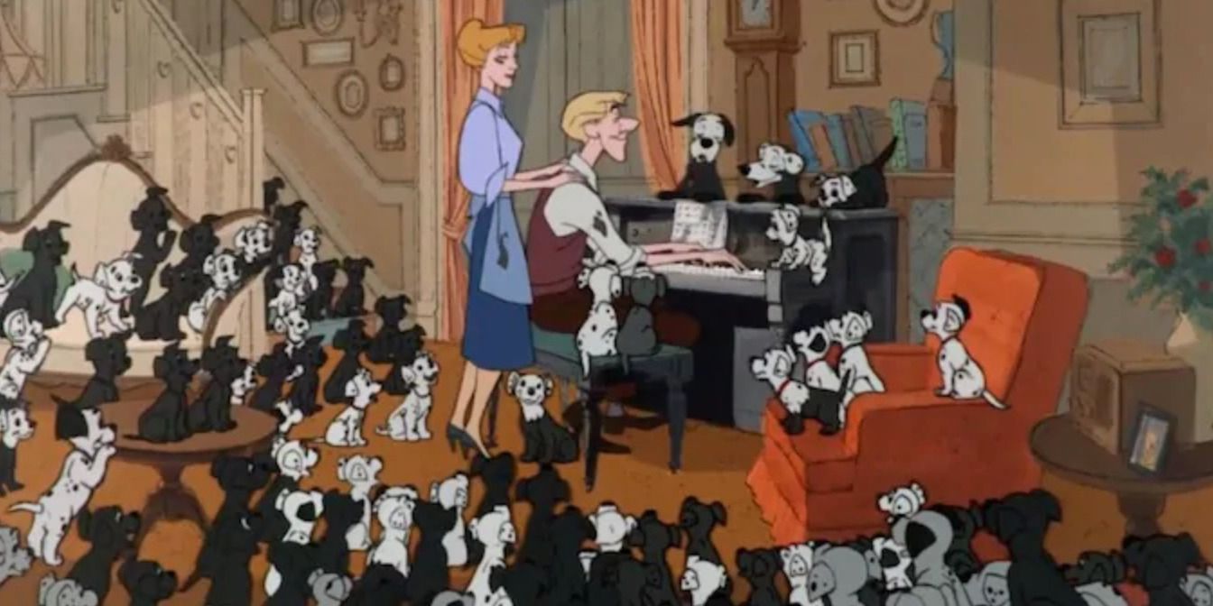 Dalmatian puppies sitting around Roger and Anita at the piano in 101 Dalmations