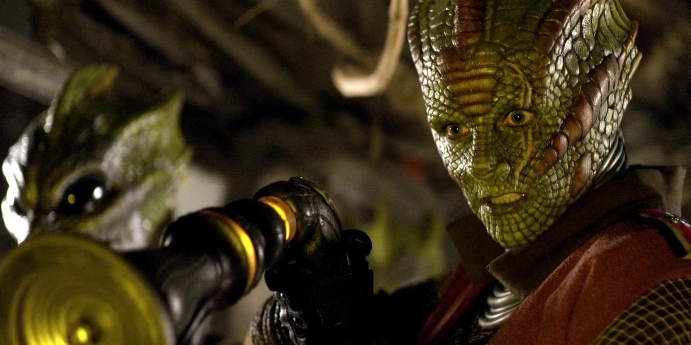 Restatic the Silurian pointing a gun in Doctor Who