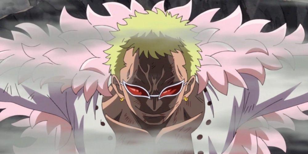 Doflamingo grinning in battle with smoke around him in One Piece