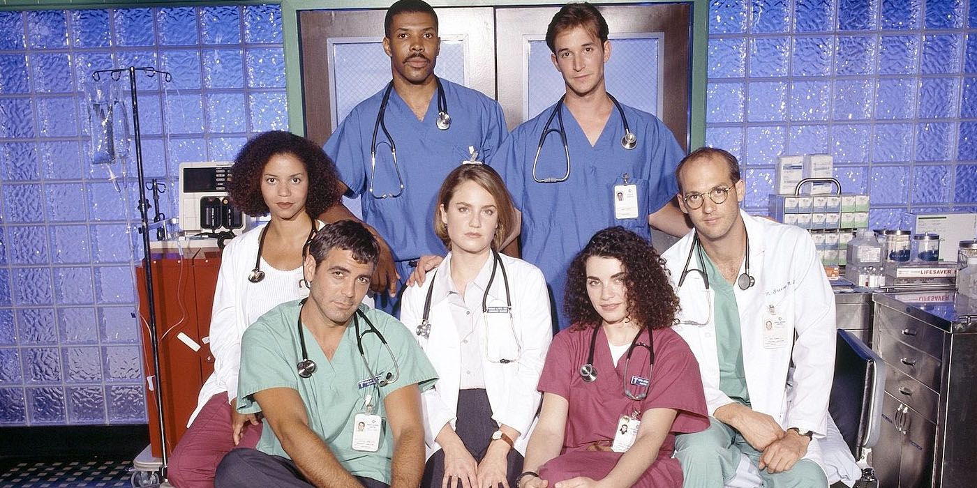 The ER doctors and nurses with the surgeons in the background for Season 3