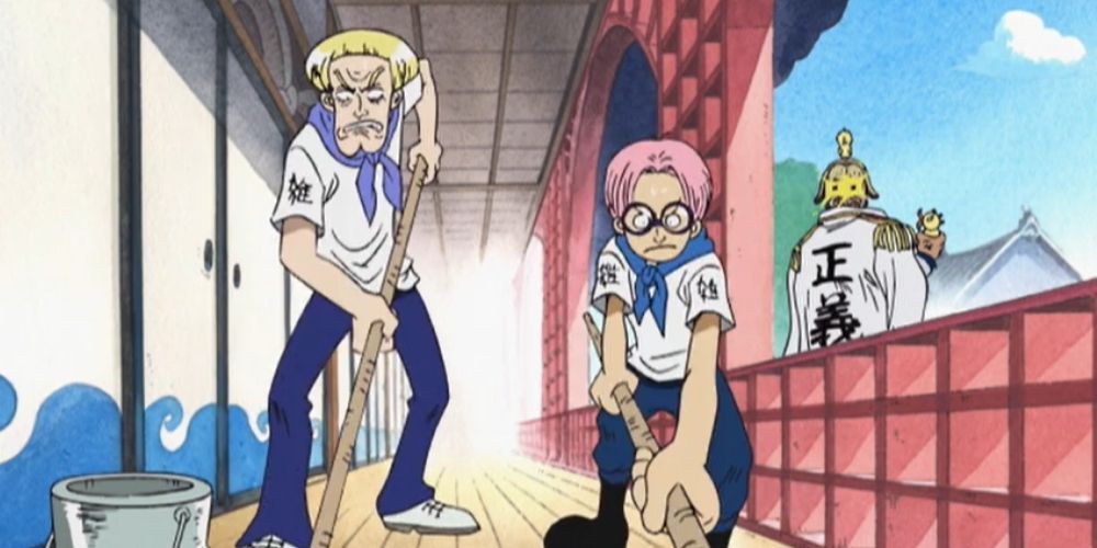 Garp glaring at Koby and Helmeppo while they mop in One Piece