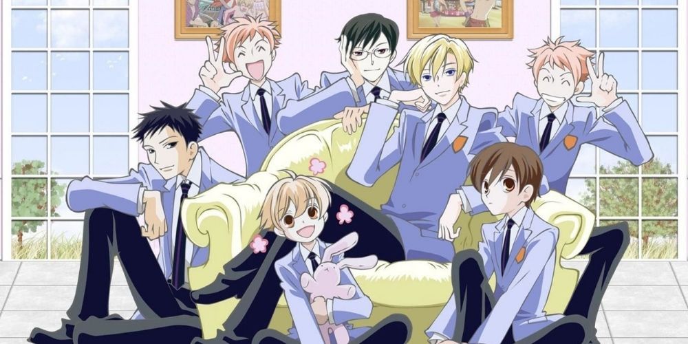 Haruhi with the Host Club lounging on a couch in Ouran High School Host Club.