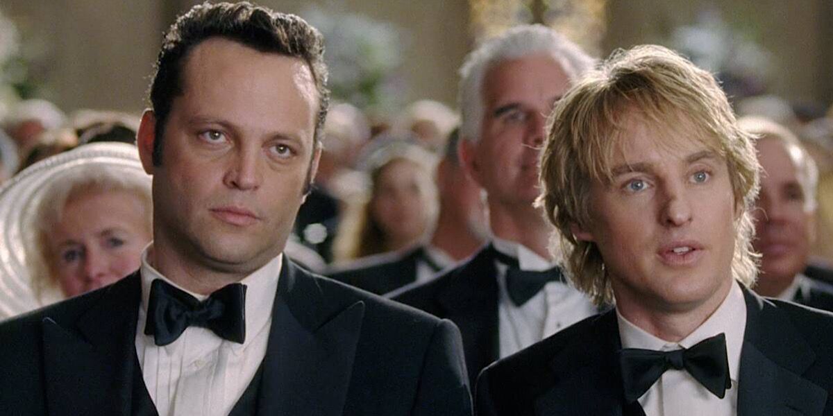 John and Jeremy wearing tuxedos at a wedding - Wedding Crashers