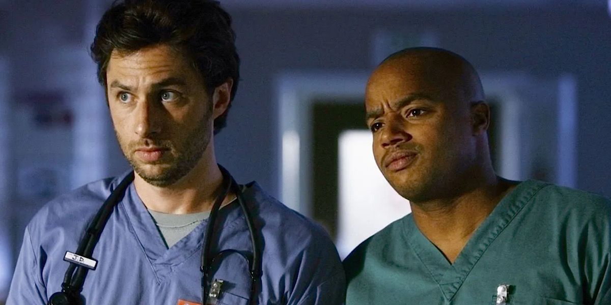J.D. and Turk staring at something in front of them in Scrubs