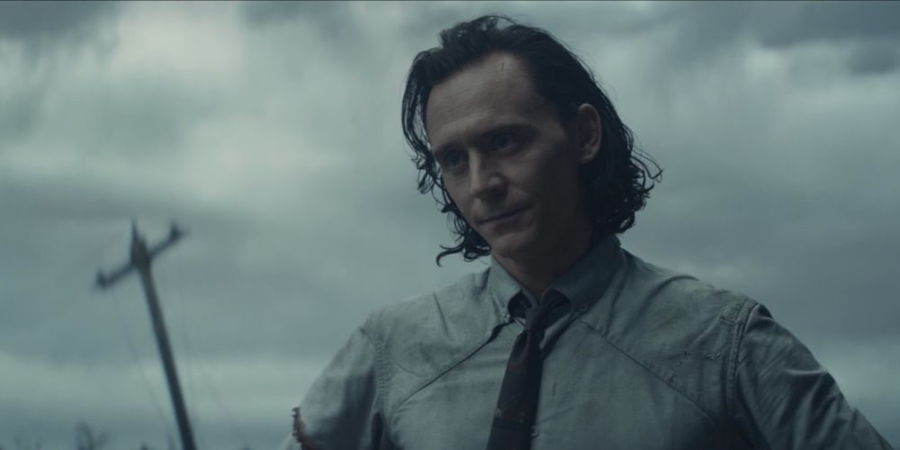 Loki looking unimpressed under grey sky in the Loki TV series MCU.