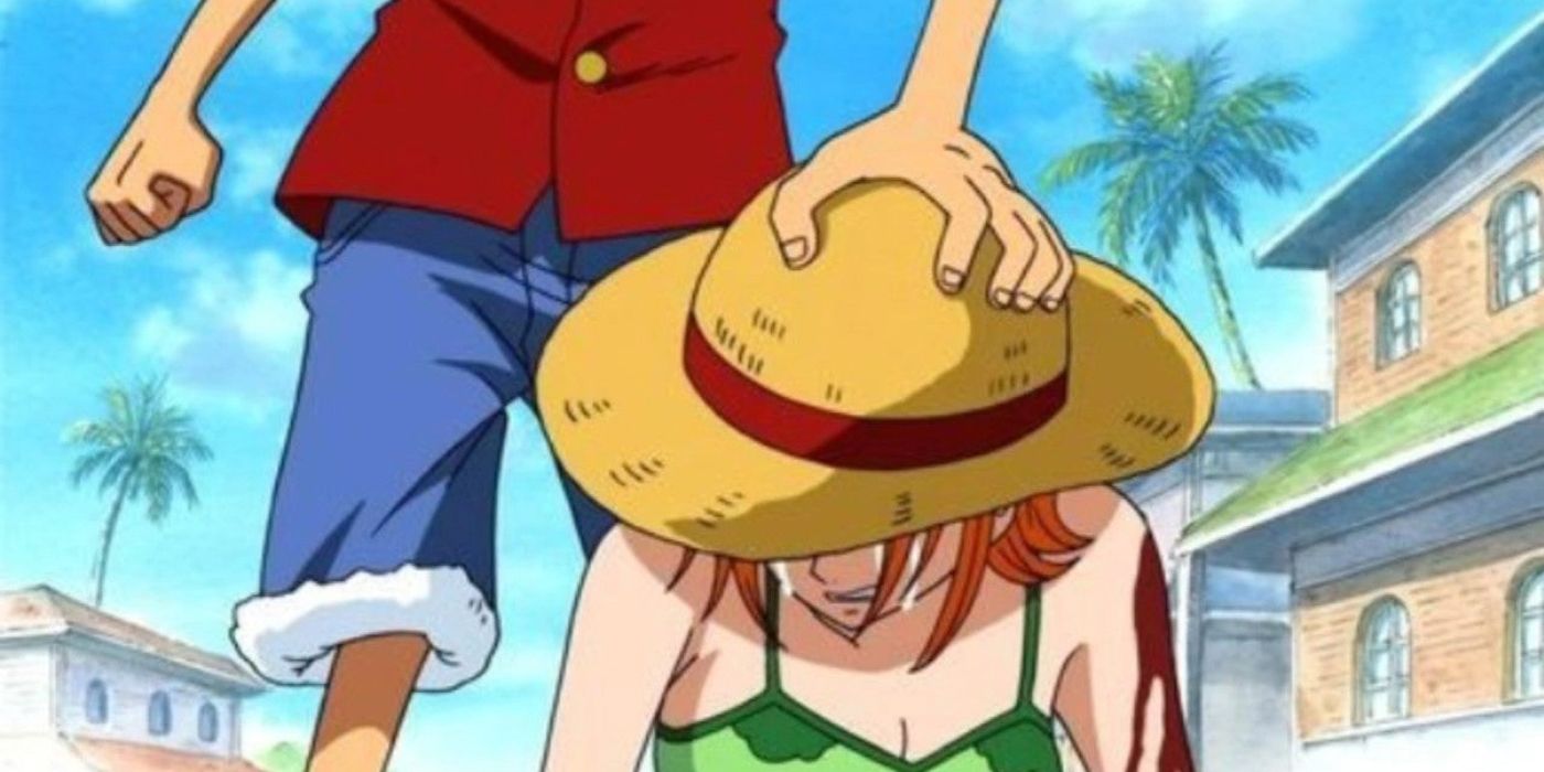 Luffy gives Nami his hat in One Piece.
