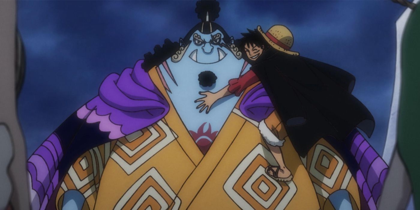 Luffy hugging Jinbe in One Piece