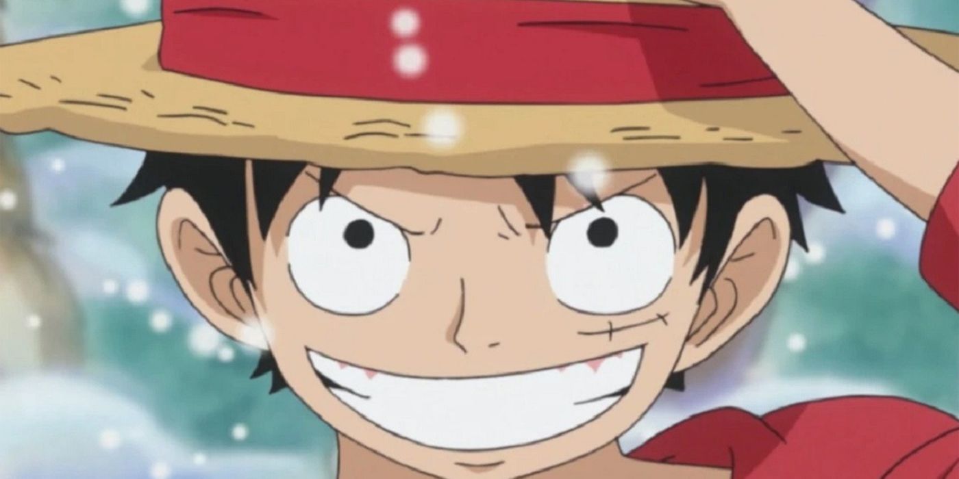 Luffy adjusting his straw hat in One Piece.
