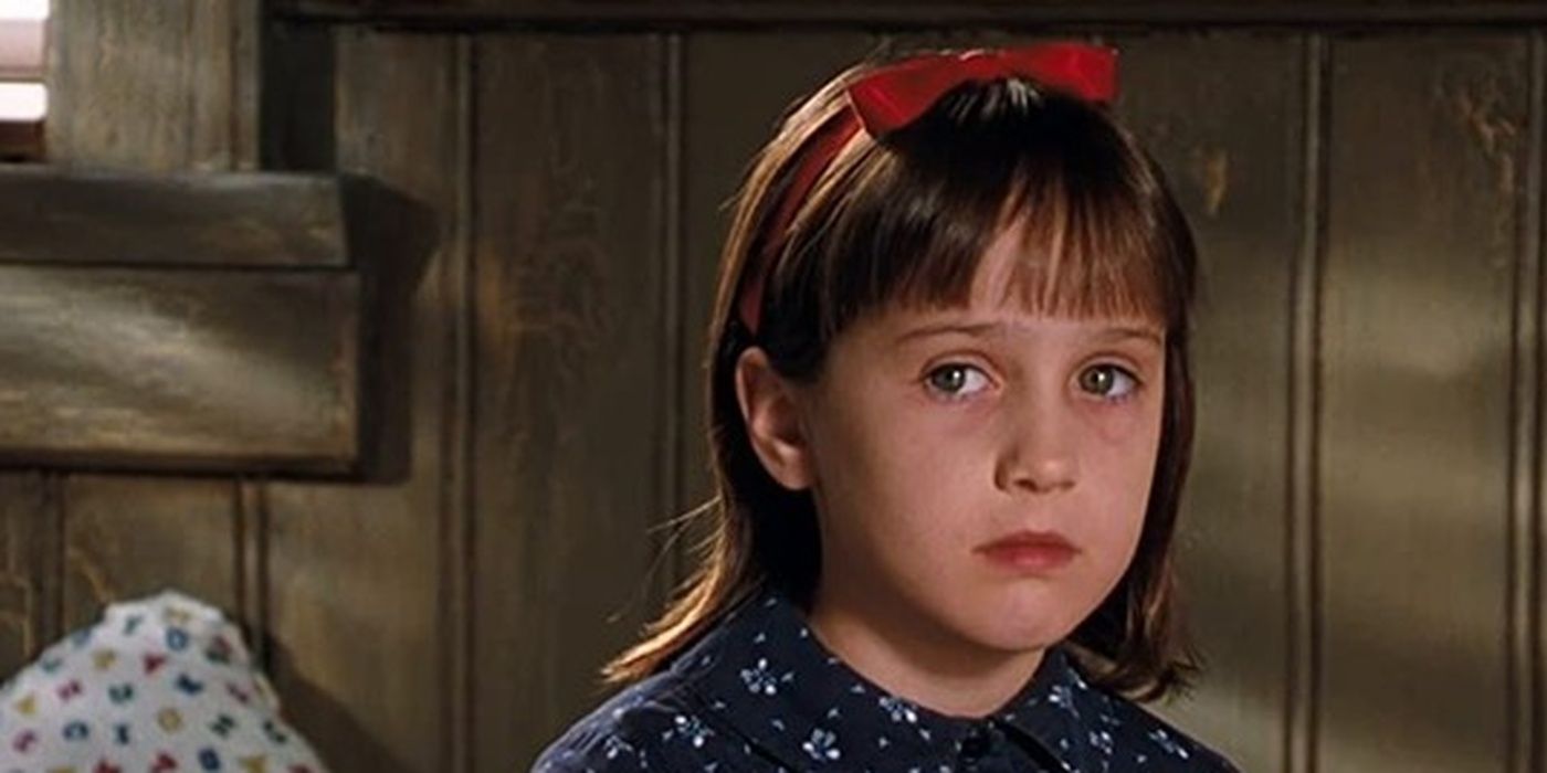 Mara Wilson as Matilda, looking sad with bow in her hair 