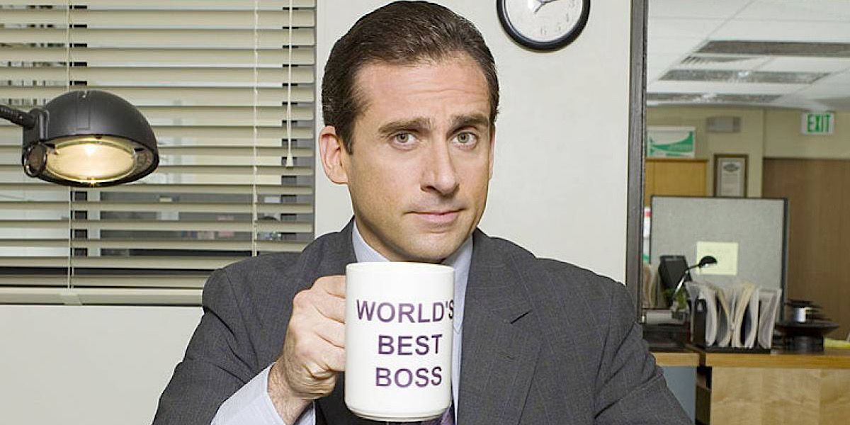 Michael Scott holding a mug that says "World's Best Boss" - The Office