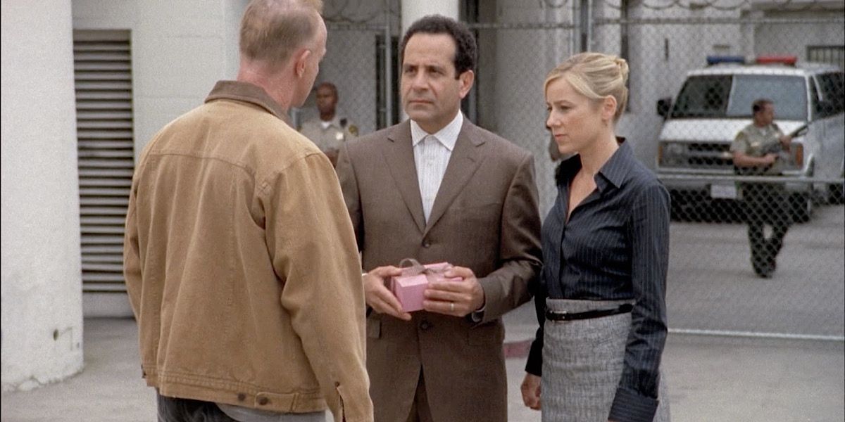 Monk and Julie standing outside the prison talking to a man - Monk