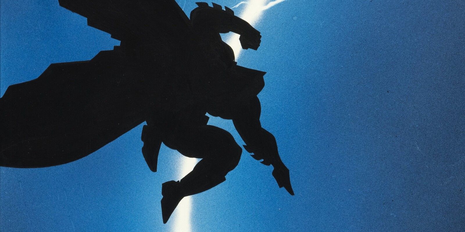 Batman in shadow jumping through the sky