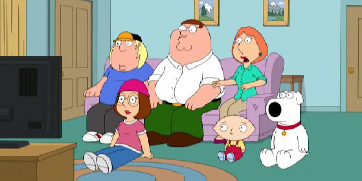 The Griffin family sitting in front of the TV - Family Guy