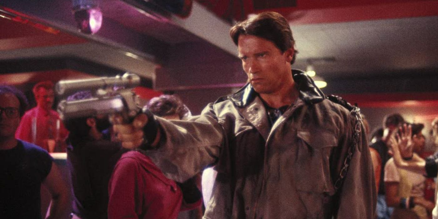 The Terminator (Arnold Schwarzenegger) takes aim at Sarah Connor.