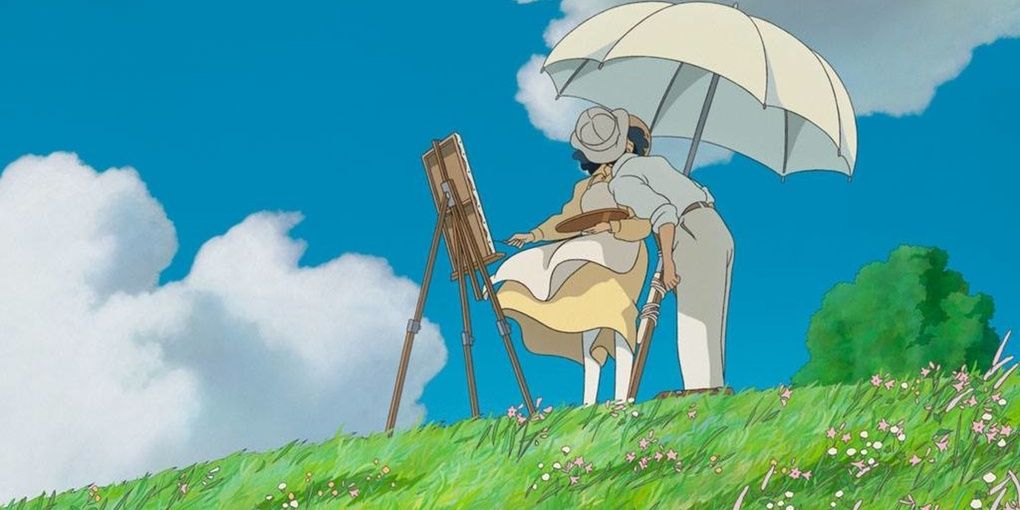 Jiro and Nahoko kissing under an umbrella in The Wind Rises.