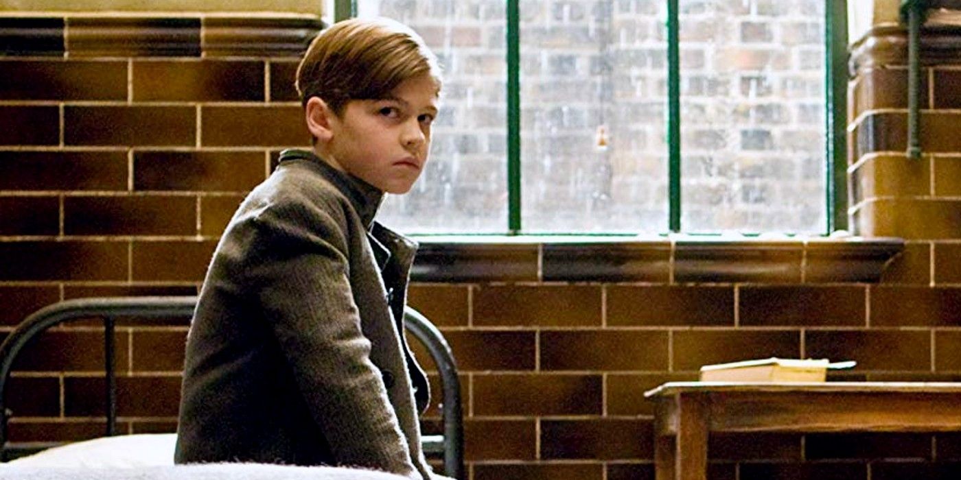 A young Tom Riddle in his room at an orphanage in Harry Potter